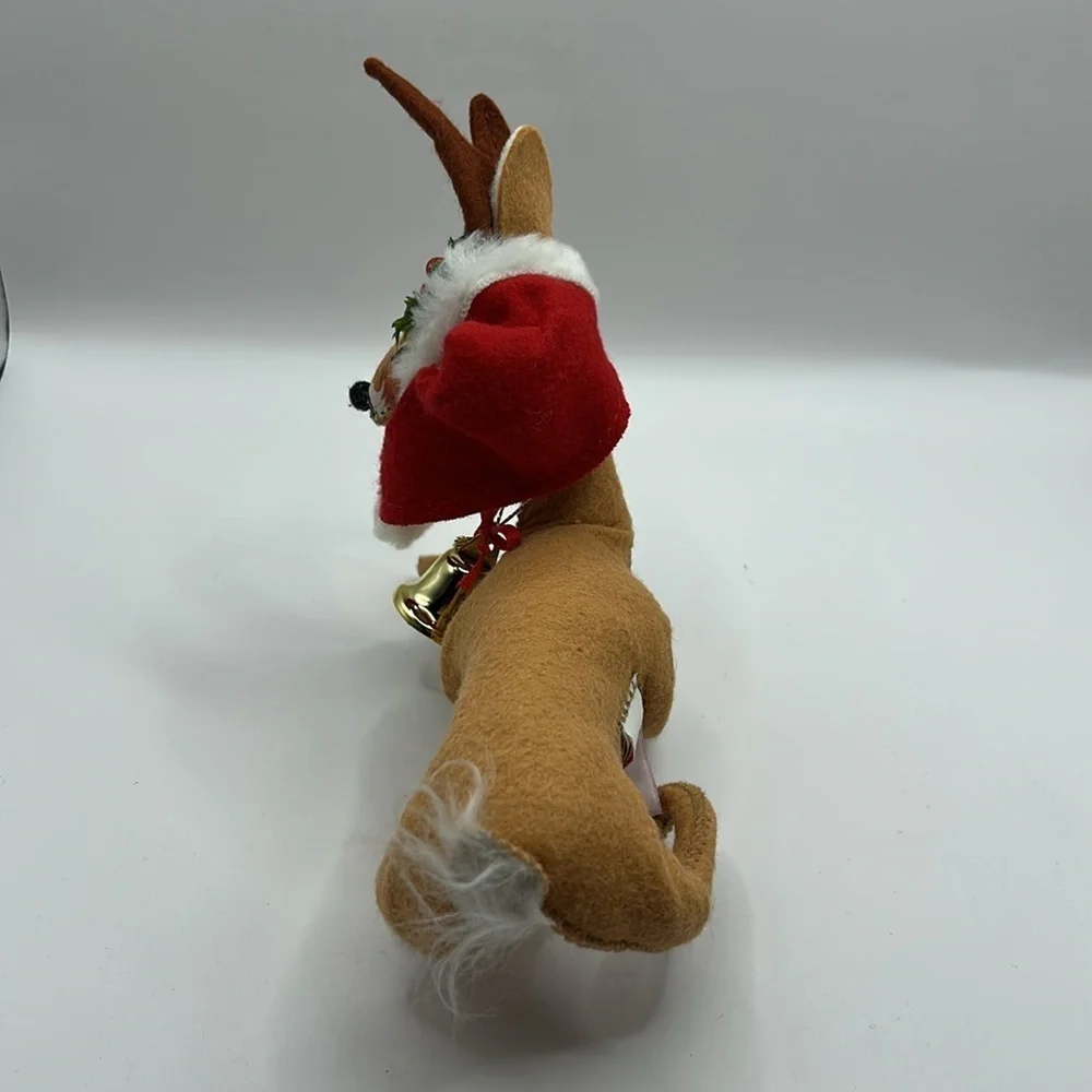 Annalee Reindeer wearing a Santa hat and bell